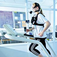 Patient runs on a treadmill as part of a physical exercise examination