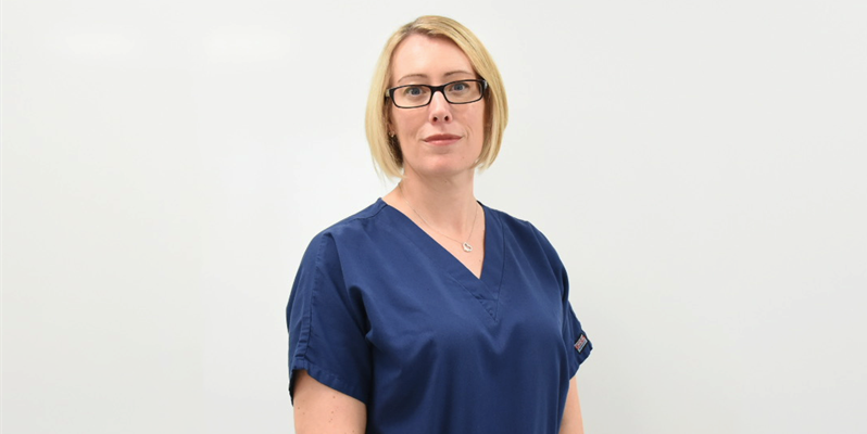 Professor Claire Smith in the anatomy suite at bsms in blue scrubs