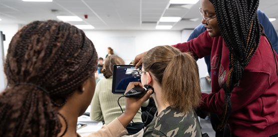 3 students using ultrasound equipment during a vr anatomy session
